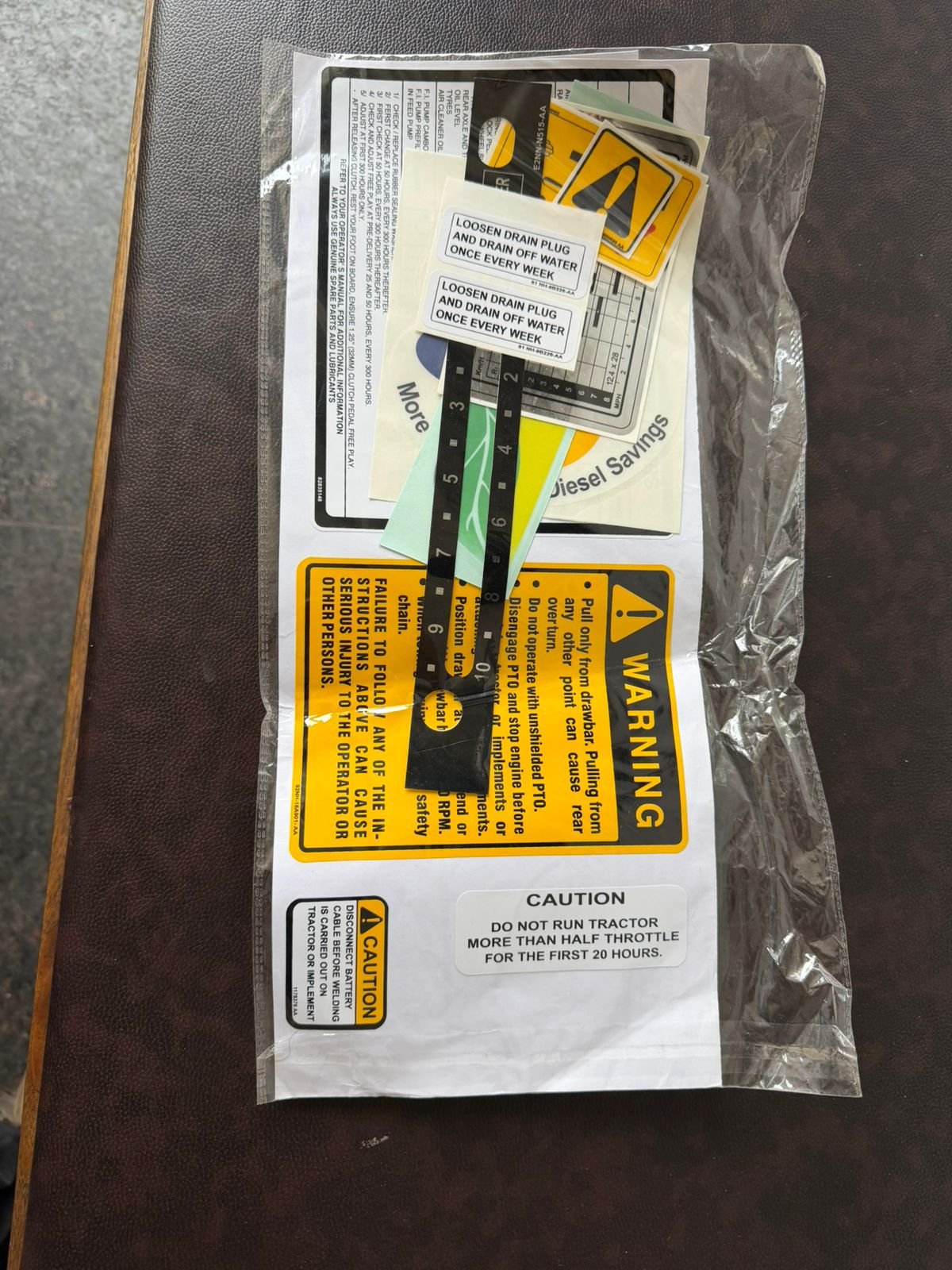 Tractor safety, warning and caution sticker kit with PTO, hour-meter and emission decals