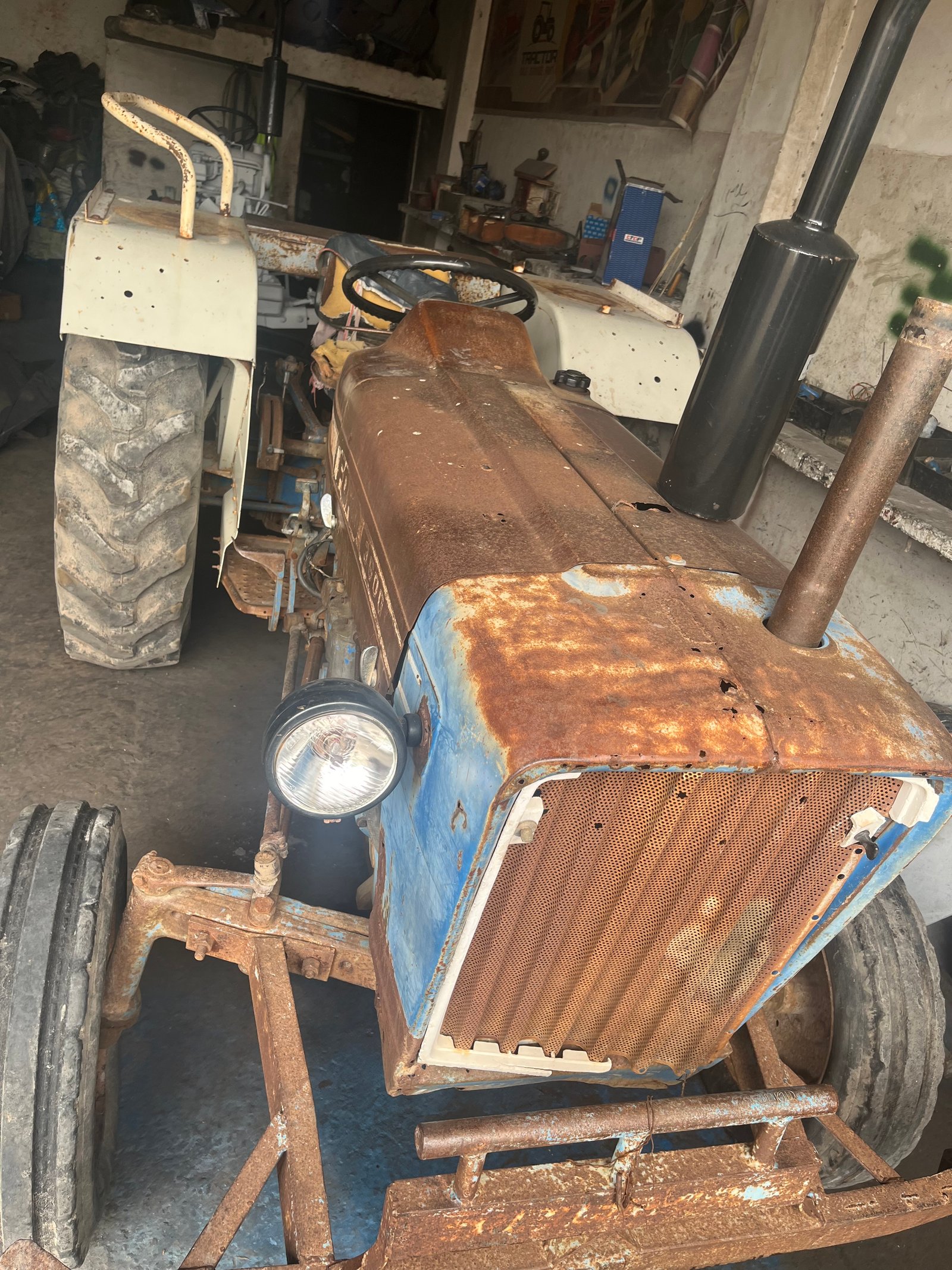 Ford 3600 before restoration, rusty bonnet