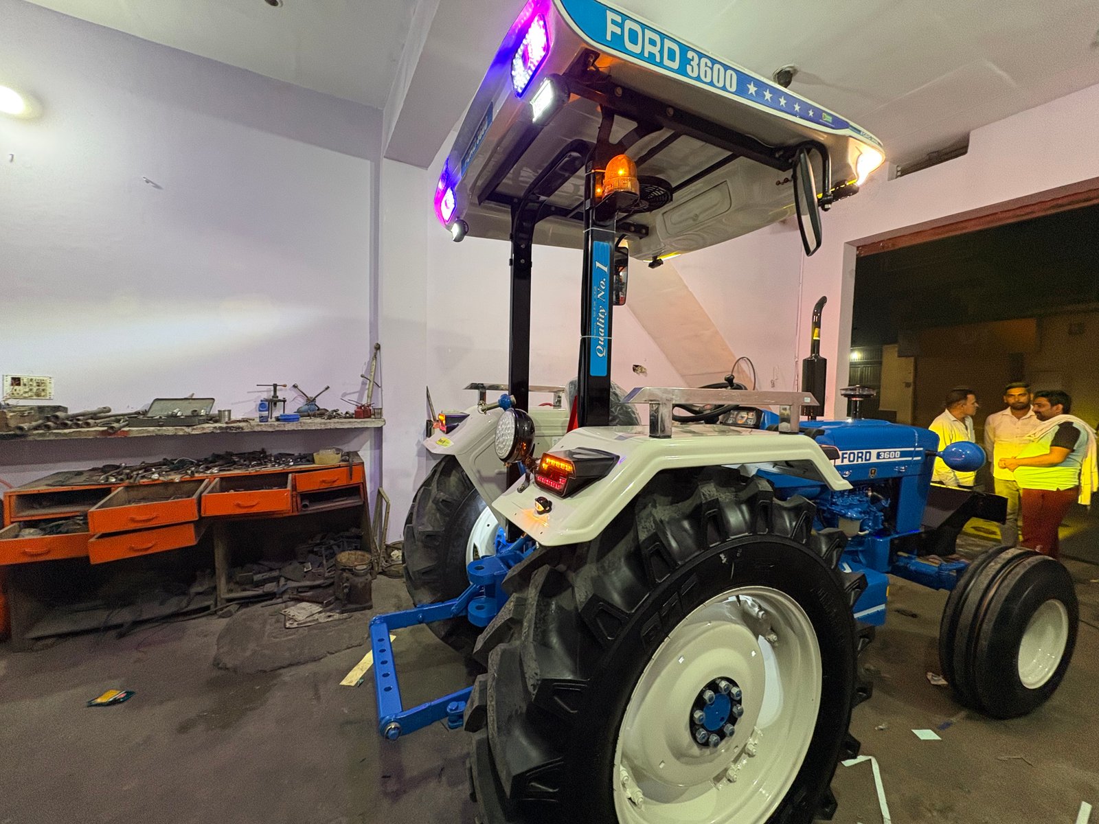 Ford 3600 restored, custom beacon lighting, night shot