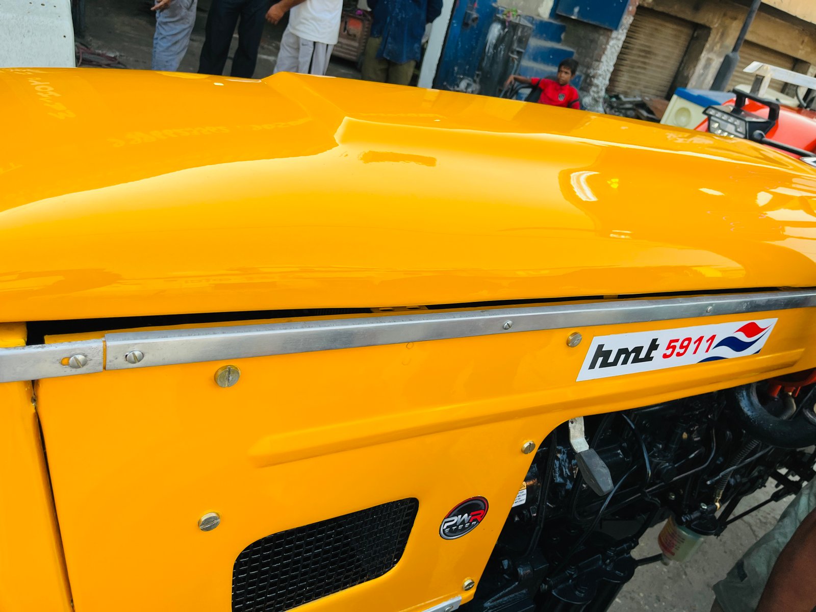 HMT 5911 restored tractor, yellow, badge and decal detail