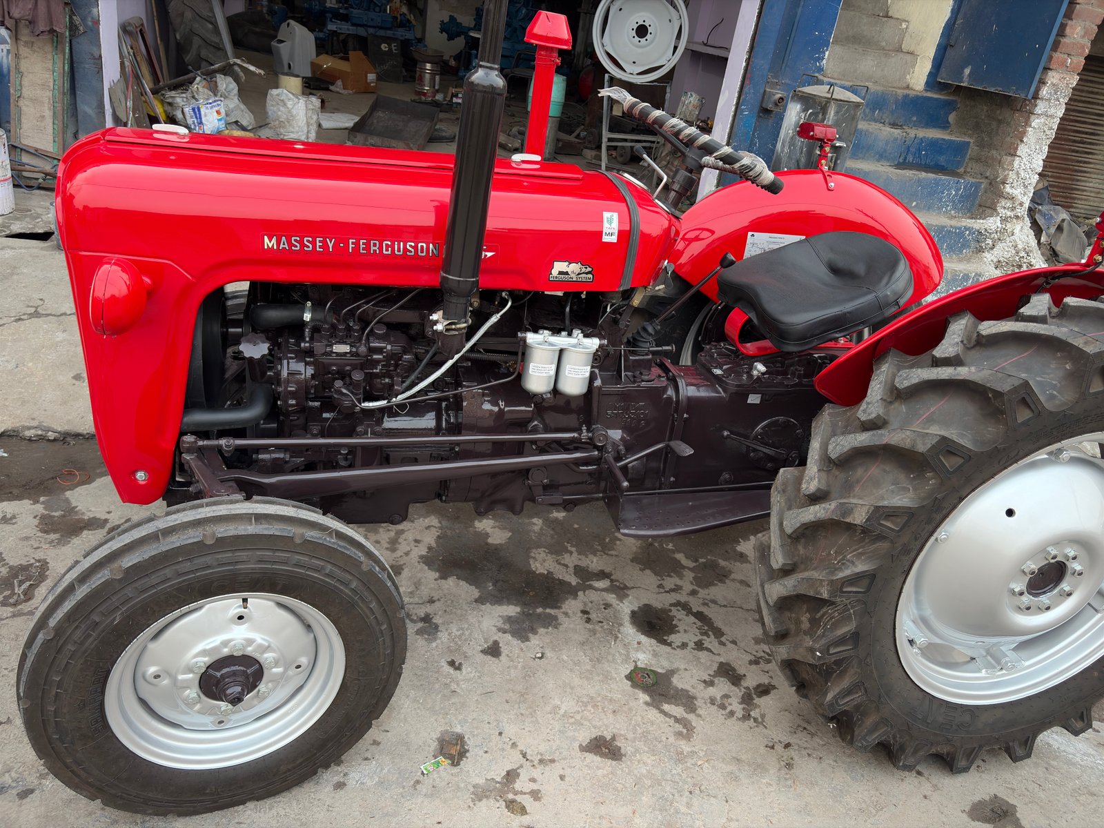 Massey Ferguson restored tractor, red, side view